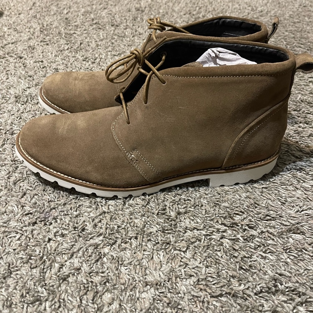 Rockport, brown, lightweight and shock absorbing. One worn once